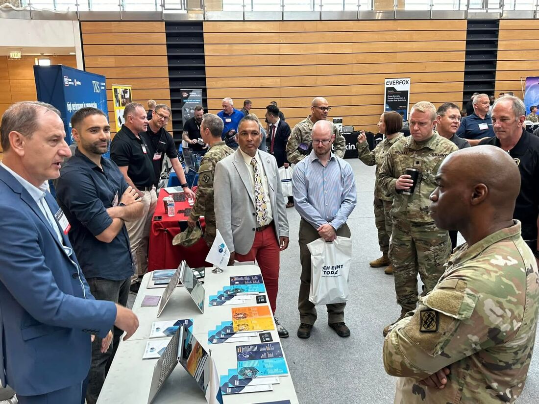 Team members at a security industry conference